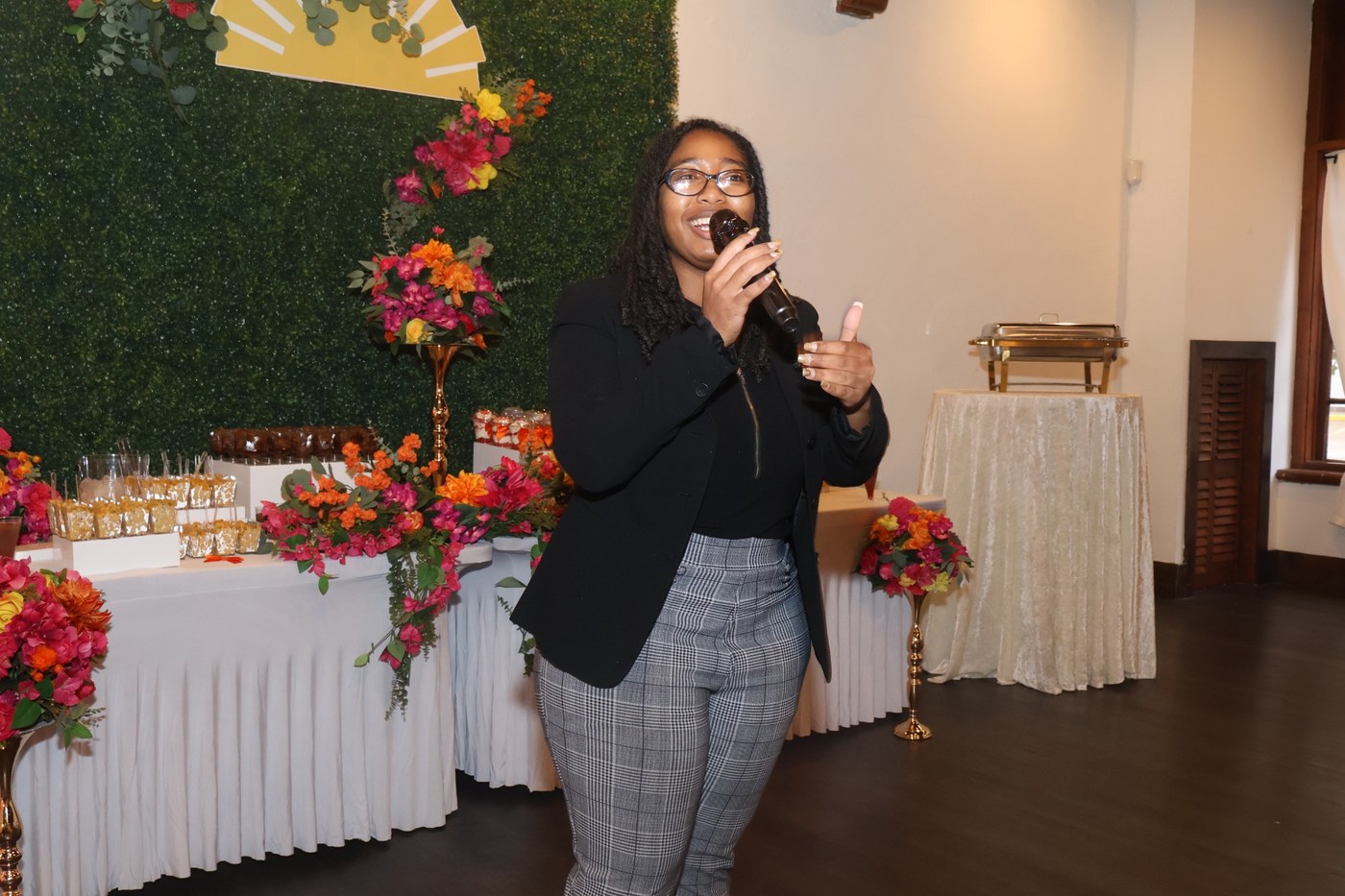 LaCole Purley delivering a keynote message at a community self-care event